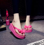 rose-wedge-flip-flops-with-bow-model