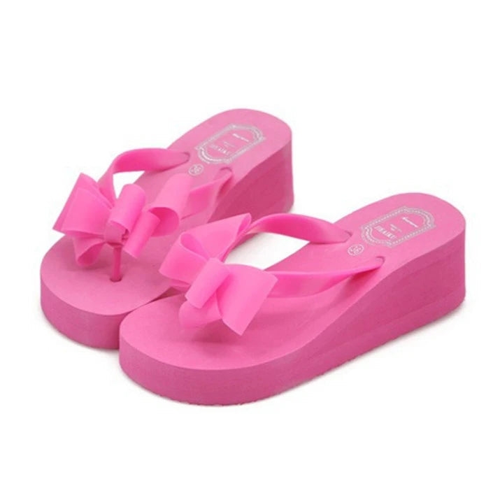 rose-wedge-flip-flops-with-bow-pair