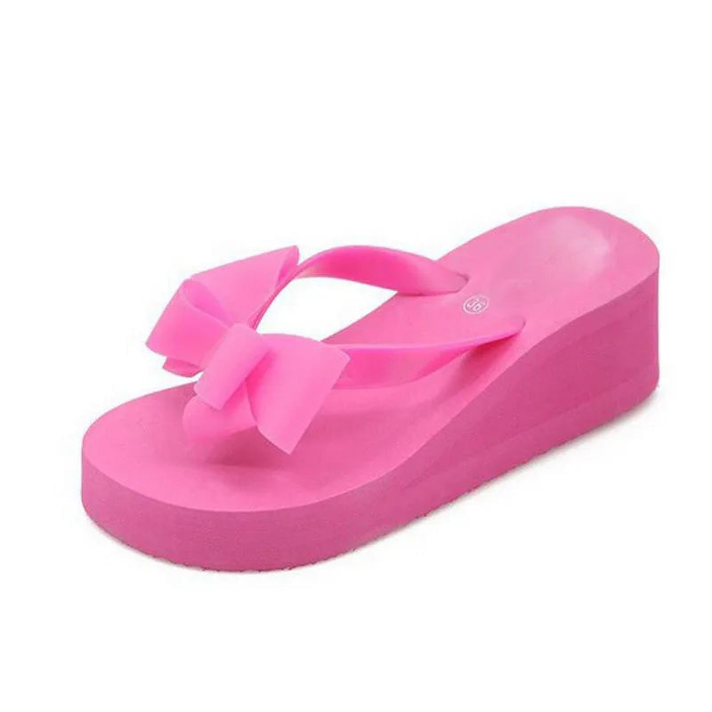 rose-wedge-flip-flops-with-bow