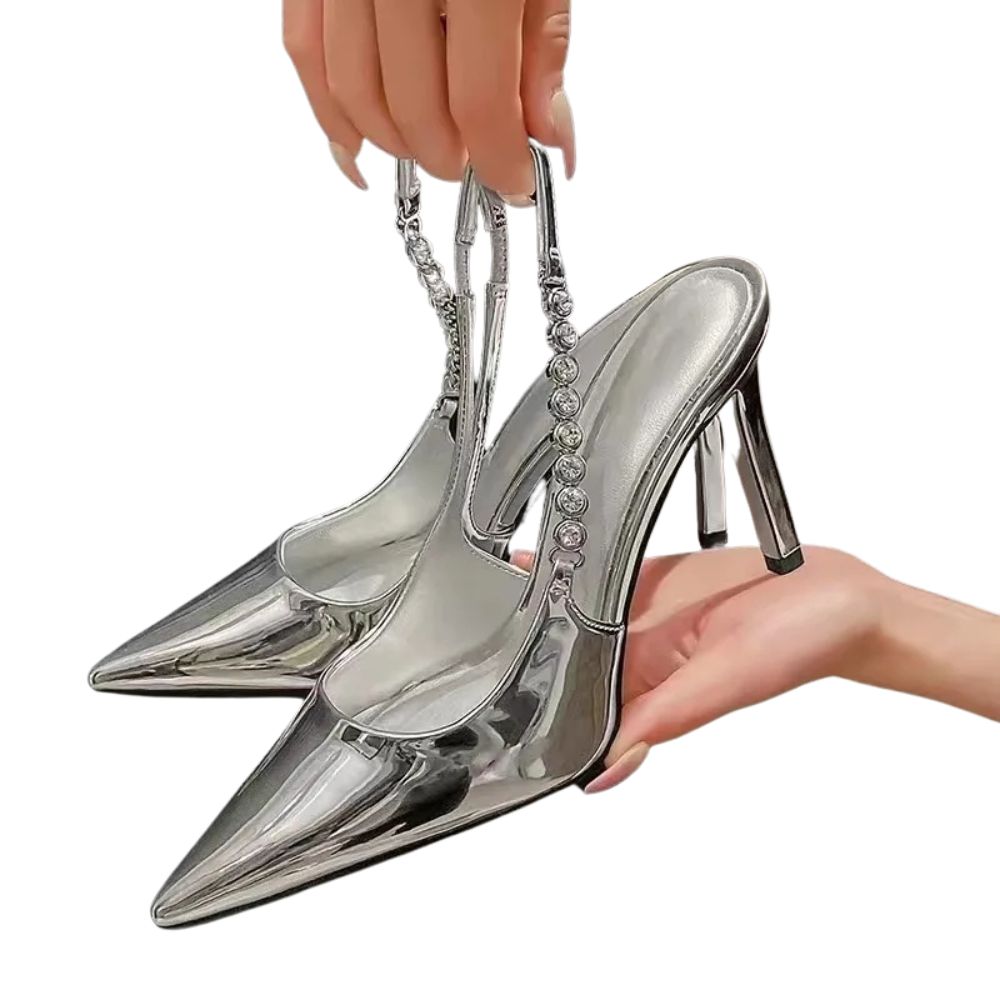 silver-slingback-high-heels-hands