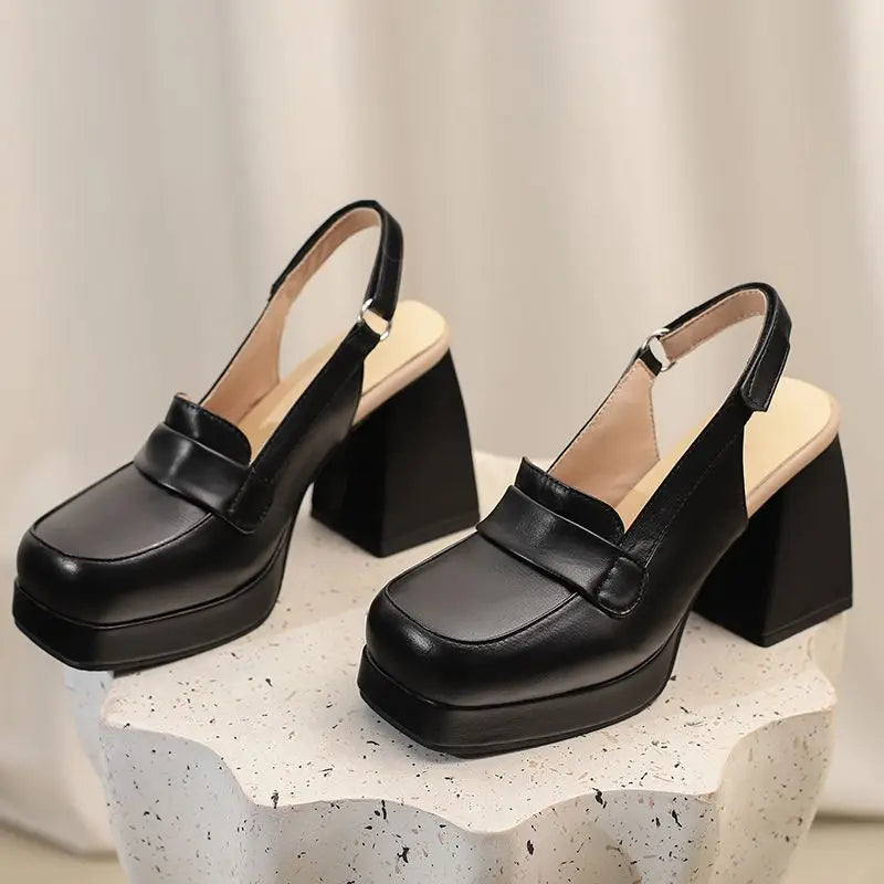 slingback-heeled-loafers-black-pair