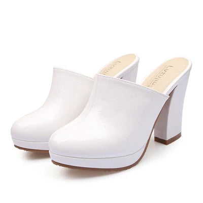 white-block-heel-mules-pair