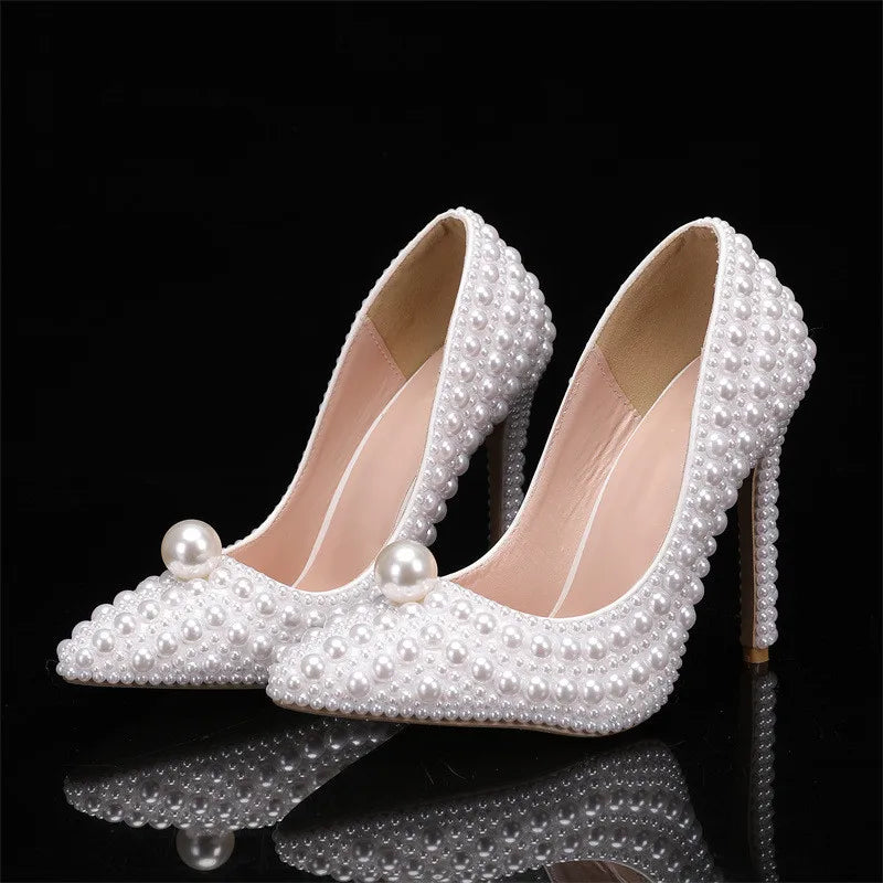 white-closed-toe-heels-with-pearls-pair