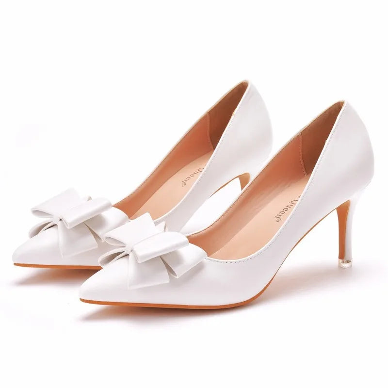 white-heels-with-bow-on-front-3-inch-pair
