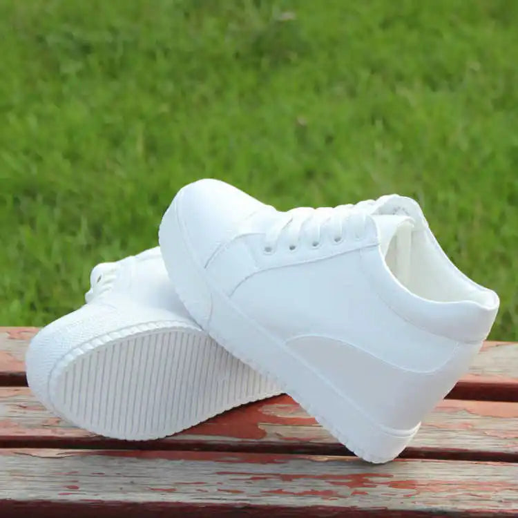 white-hidden-wedge-sneakers-pair-photo