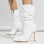 white-mid-calf-heeled-boots-pair