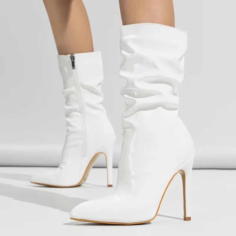 white-mid-calf-heeled-boots-pair