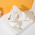 white-pointed-toe-mule-heels-pair