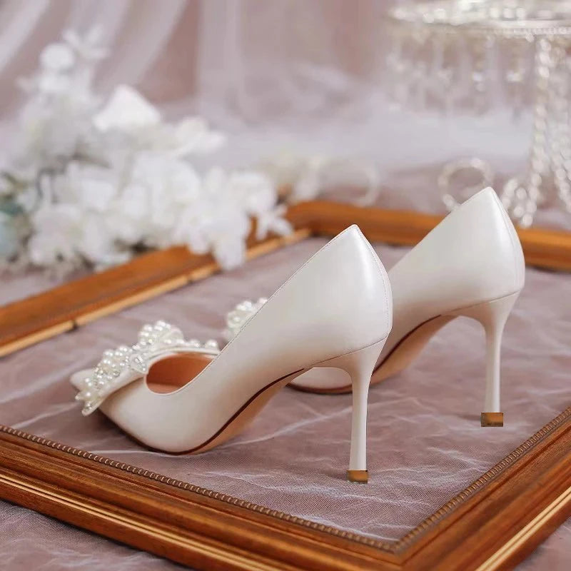 white-wedding-heels-with-bow-back