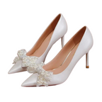 white-wedding-heels-with-bow-pair