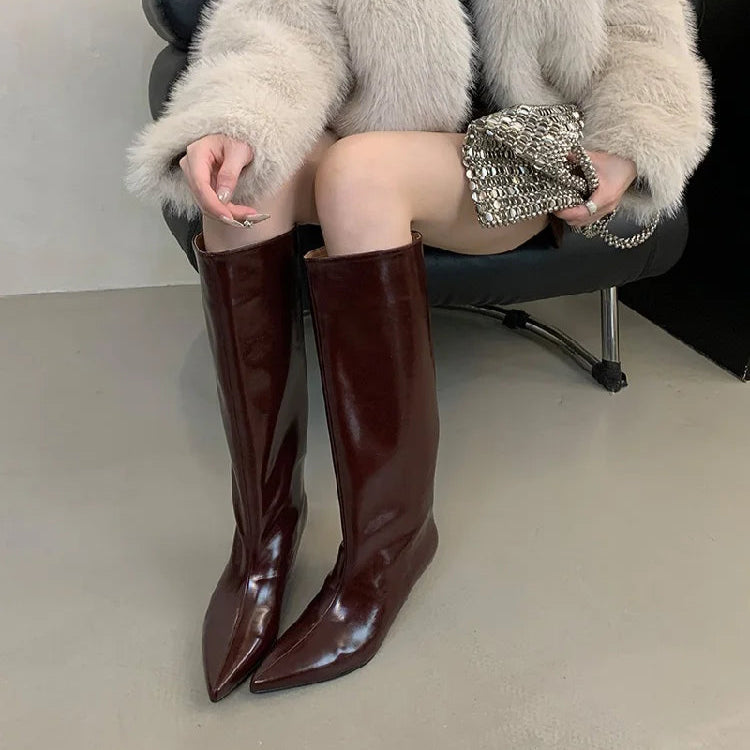 woman-wearing-brown-kitten-heel-knee-high-boots