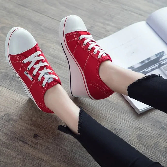 women-red-wedge-sneakers-photo