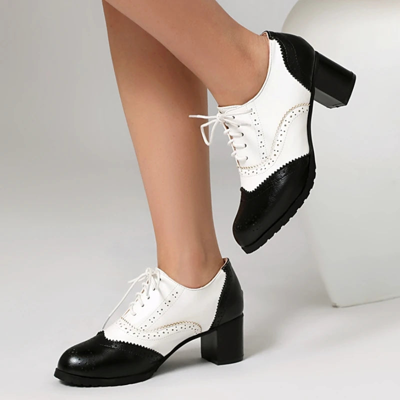 women's-black-and-white-heeled-oxfords-side