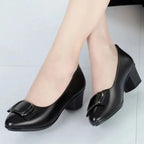 womens-black-dress-low-heel-shoes-sitting