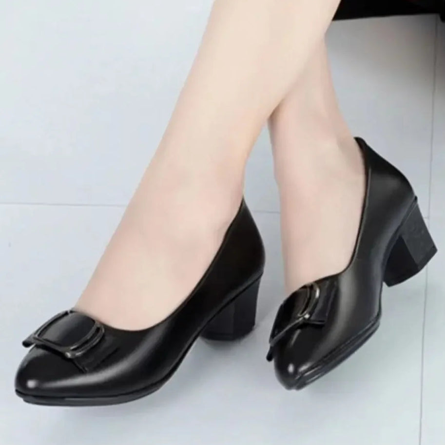 womens-black-dress-low-heel-shoes-sitting